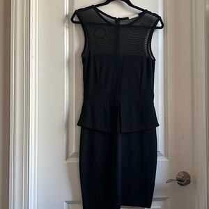 Tanya Marie small black sleeveless dress.